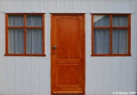 Typical simple house with color-bond steel walls