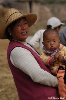 Chinese minority people during autumn harvest
