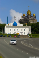 New Russian church being built behind the old one.