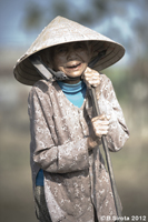 Old woman in Hoi An